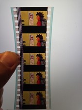 Pokemon 35mm Film Cell Strip Movie Mewtwo Strikes Back Brock looking at Poster