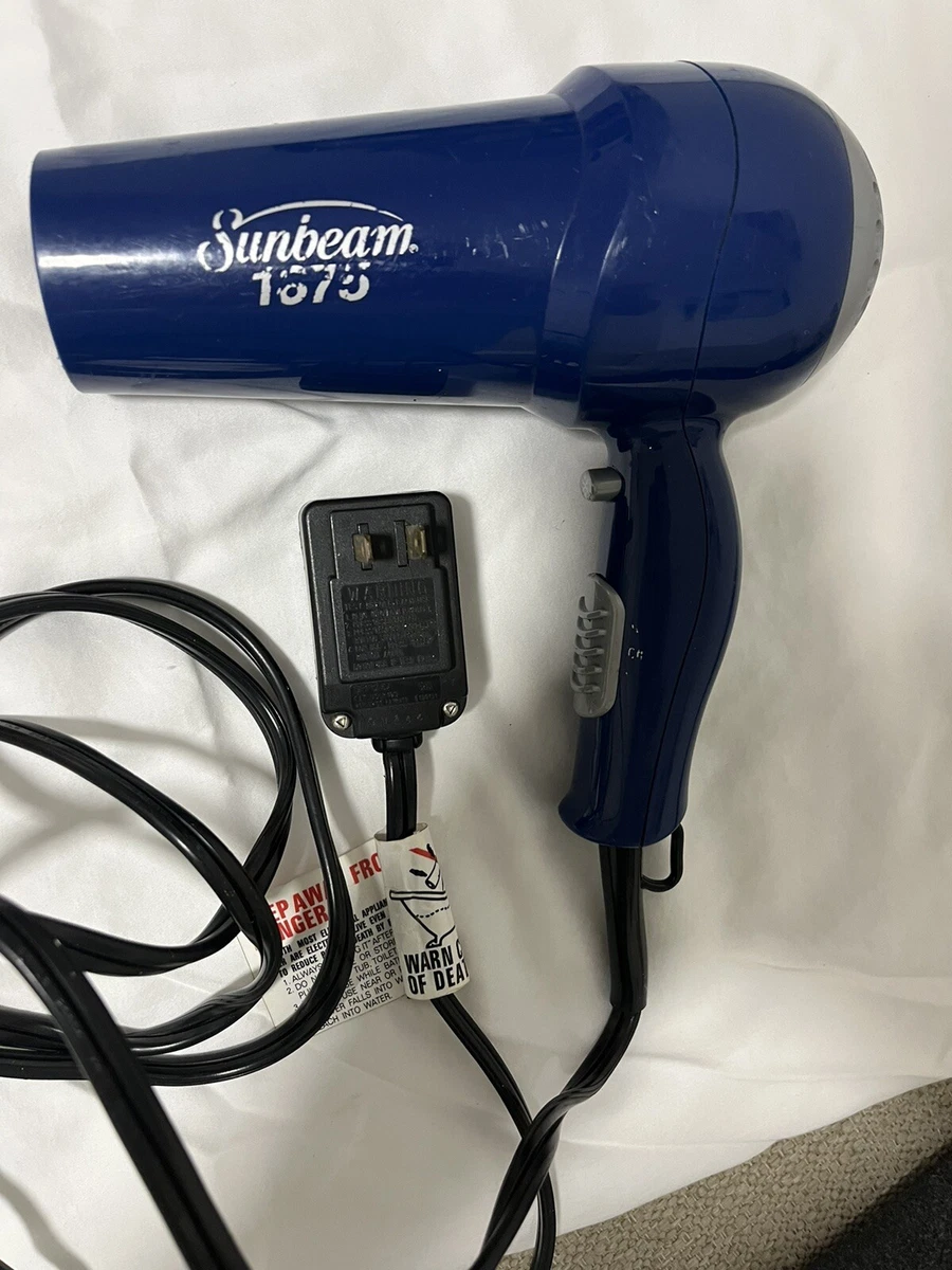 Hand held top blow dryer