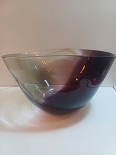This is a purple and brownglass bowl.
