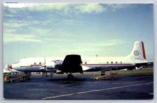 Vintage Postcard- Overseas National Airlines Douglas DC-7 Airplane on the ground