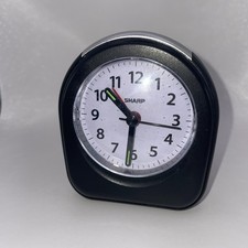 Sharp Travel Alarm Clock with Glow in Dark  Light Quartz Analog Model SPC844