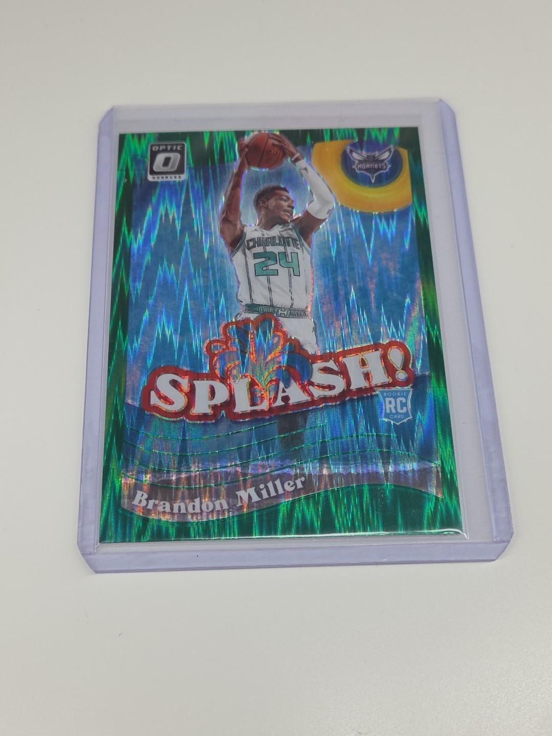 2023-24 Donruss Optic Splash Green Shock Prizm #11 Brandon Miller RC - Hornets