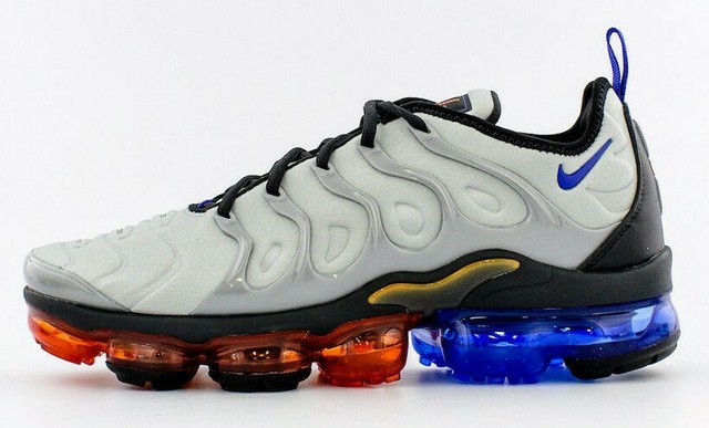 white and silver vapormax plus