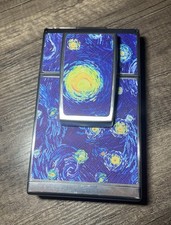 Polaroid SX-70 Land Camera, Refurbished Silver w/ Starry Night Skin.
