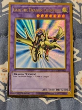 Gaia the Dragon Champion -  Gold Rare  MAGO EN025 1st Ed Yugioh