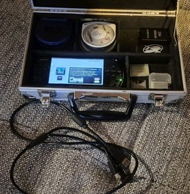 Near Mint, Barely Used, PSP Slim w/10 Games, Memory Sticks, Batteries, Case+