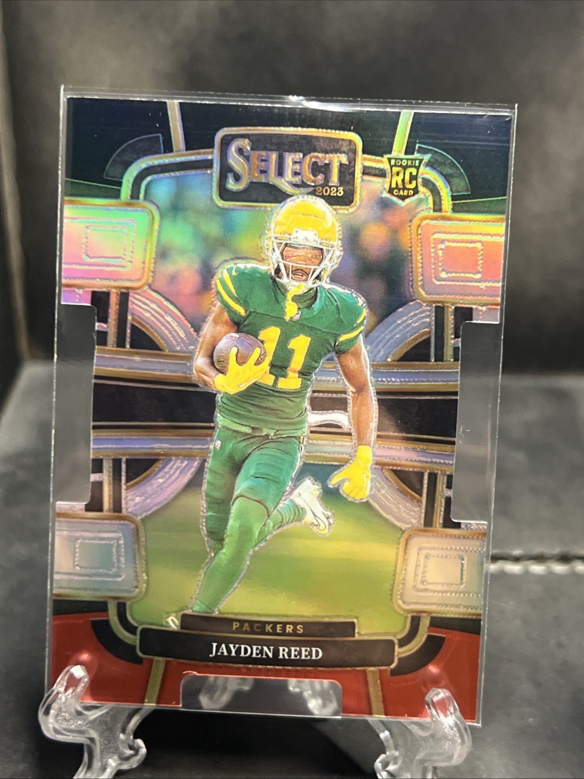 2023 Panini Select - Concourse Jayden Reed #38 Black & Red Prizm Die-Cut (RC)