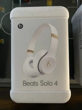 Beats Solo 4 over ear headphones new in box warm white
