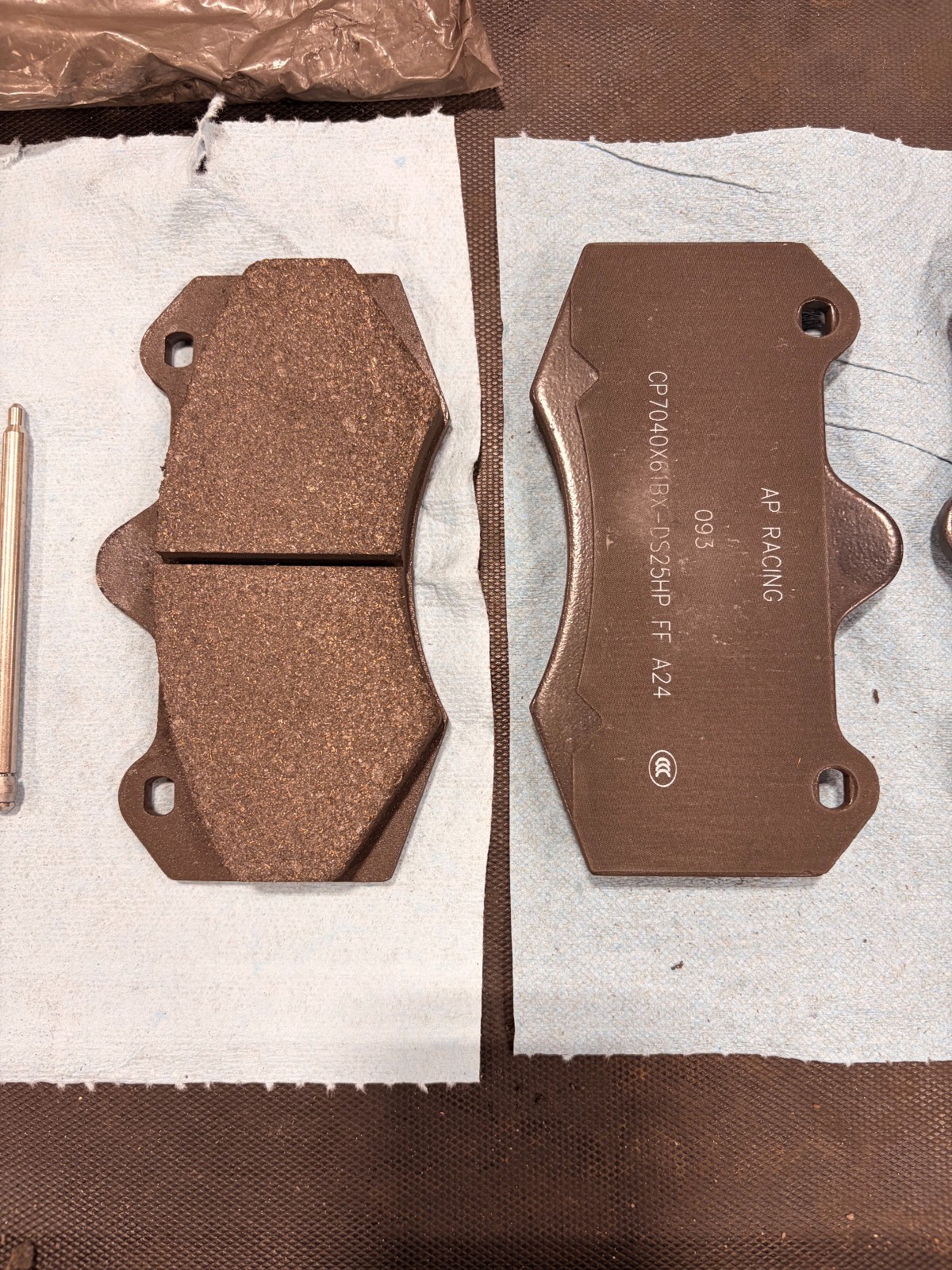 Lotus Emira AP Racing Front Brake Pad Set w/ Hardware non California with copper