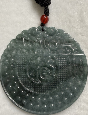 Green Round Carved Jade Pendant Necklace on Black Cord w