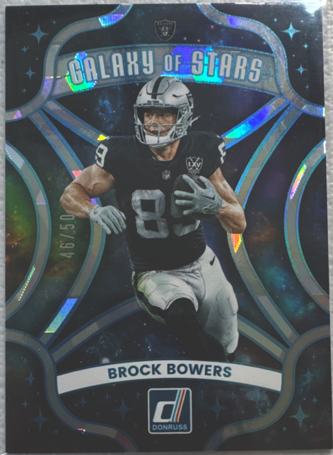 Panini 2025 Donruss Galaxy of Stars Brock Bowers #11 Raiders Cubic SN# 46/50
