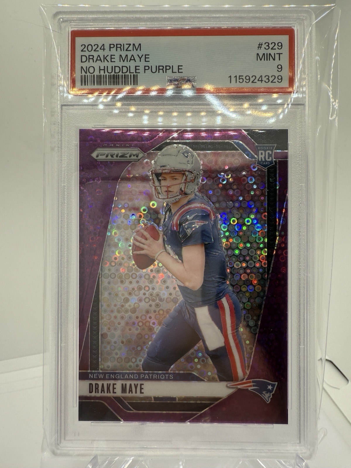 2024 Panini Prizm - Rookies Drake Maye #329 Purple No Huddle Prizm /49 (RC)
