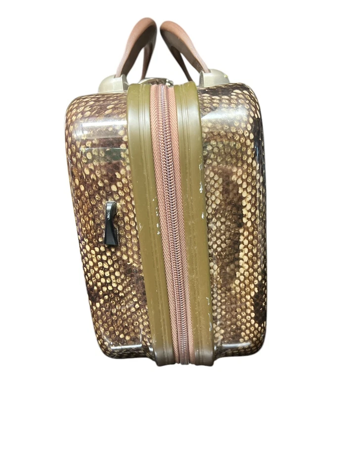 Estuche de maquillaje de equipaje rígido de piel de serpiente HEYS bolsa para pasar la noche Foto 2 de 4