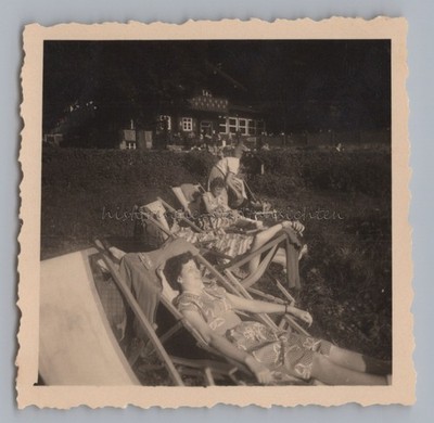 Wernigerode 1955-tourists sunbathing in front of inn-old photo
