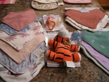 Lot of 12 Baby Bibs, Pacifiers and Plush Tiger Holder
