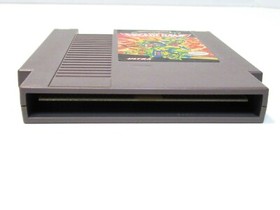 LOT OF 2 NES GAME CARTRIDGES CAPCOM'S COMMANDO, AND TEENAGE MUTANT NINJA TURTLES