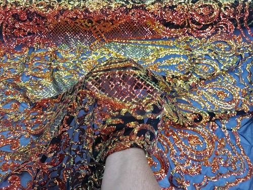 ORANGE PRINCESS IRIDESCENT SEQUINS ON A 4 WAY STRETCH BLACK MESH-SOLD BY YARD. - Picture 7 of 8