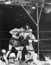 Max Schmeling hangs helplessly on ropes as Joe Louis keeps banging- Old Photo