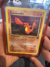 1995 charmander pokemon card value 50/82 Charmander Team Rocket 1st Edition 50/82 PSA 9 – TBC Games main image 1