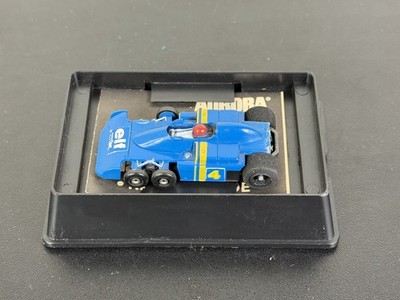 Aurora AFX G-Plus Slot Car #1738 SIX WHEEL ELF F1 Race Car #4 Good Year - READ