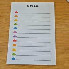rainbow cloud themed 50 sheet to do list planner pad for tasks checklists.