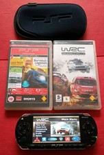 Sony PSP 1003 Black Handheld Console Bundle - Working Console, PSP case, 2 UMDs