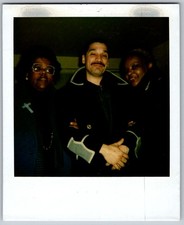 Vtg Polaroid Snapshot Photo Three Smiling Friends Coats Cross Pin Glasses