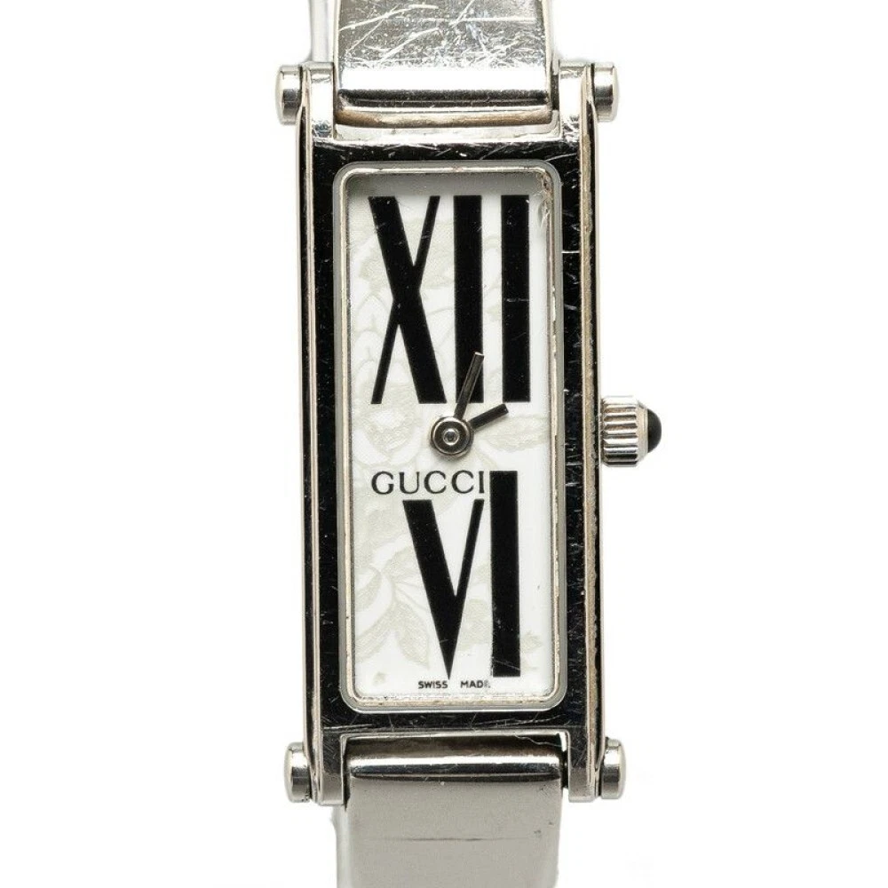 Montre Gucci 1500L Quartz Femme Cadran Blanc Fabrication Suisse Rectangle Chiffres Romains