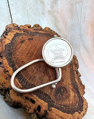 Estrella Damm silver bag hanger by Greggio | Italian vintage accessory