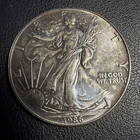1986 silver eagle first year 1 oz fine silver BU Do311