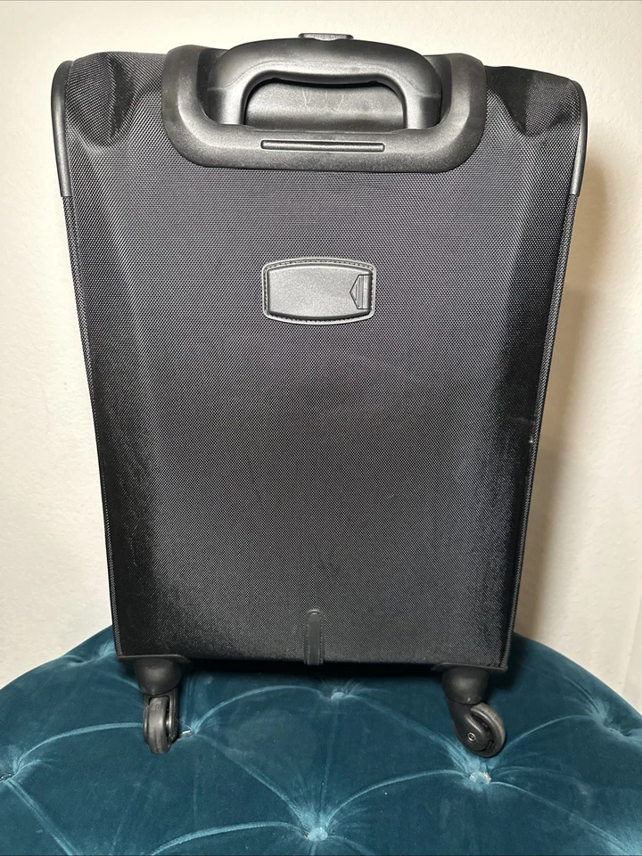 Maleta de viaje ligera Protege de 20 pulgadas con rueda vertical lateral blanda negra Foto 2 de 4