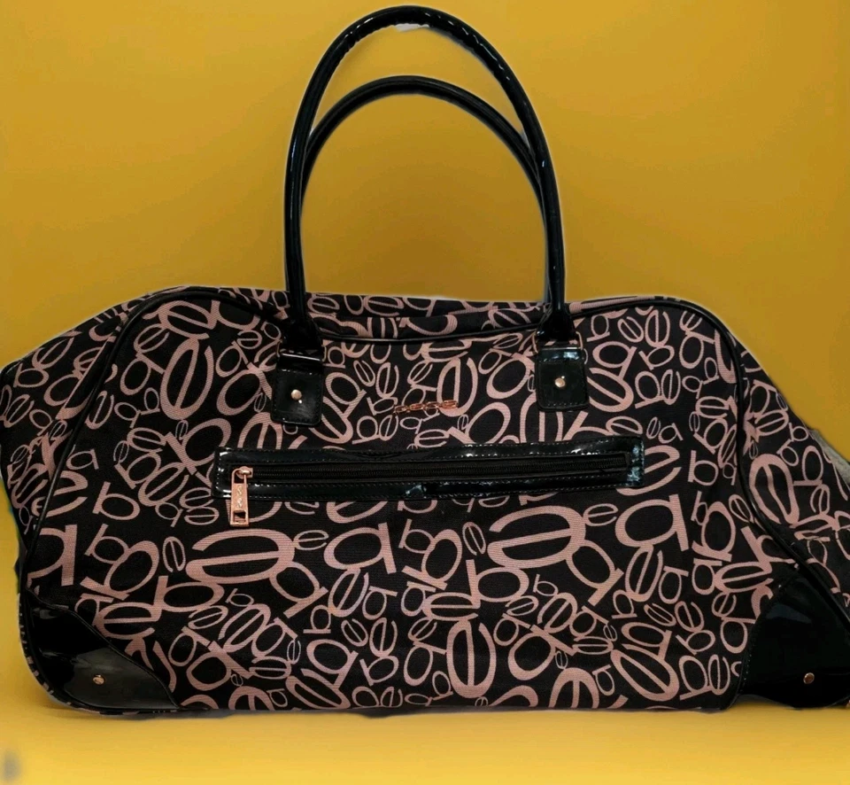 Bebe Giselle Rolling Duffell Bag Carry On Luggage Travel Weekender Bag  Used  - Image 2 of 4