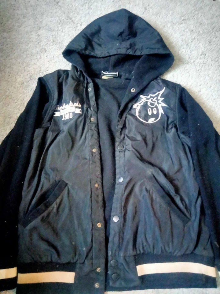 Chaqueta universitaria negra L para hombre "THE CIENTOS" con capucha (usada y usada) Foto 2 de 4