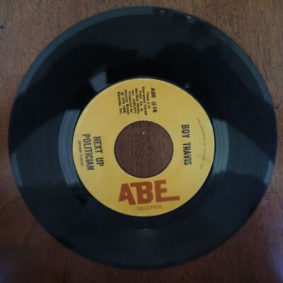 BOY TRAVIS : NEXT UP POLITCIAN / TOO MUCH EDUCATION VINYL 45 ABE VG 3-172