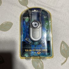 Coby CX-7 Mini AM/FM Pocket Radio DBBS Portable Earphones Neck Strap