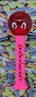 PEZ collectible Red crystal Emoji w/custom NEON PINK NEPEZCON stem 2023