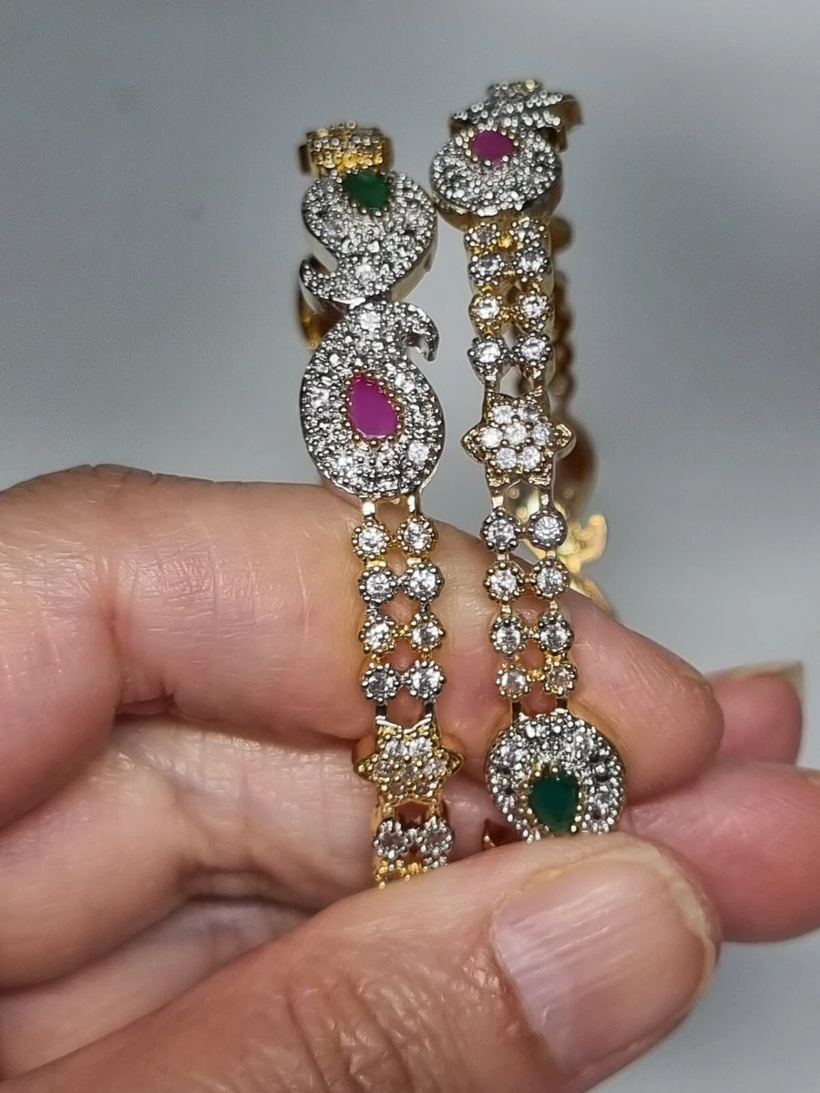 2 Gold Bangles With American Diamond Stones In Red Green And white
