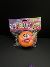 Orb Curiosities Smushers Face Swap Squishy Squeeze Stress Relief Toy ORANGE