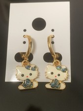 Laminated Gold Gold Hello Kitty Earrings