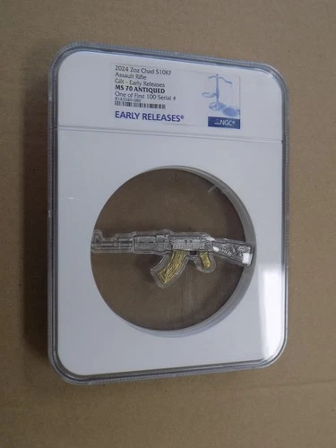 2024 Chad 2 oz Silver Assault Rifle Black & Gold Color Shaped Coin .999 NGC MS70