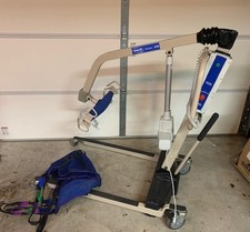NEVER USED Invacare Reliant 450 Battery Powered Patient Lift w/ Full Body Sling