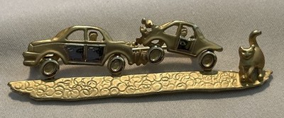 AJC PIN OF A CAT CAUSING A CAR CRASH ACCIDENT 2 5/8 INCHES LONG