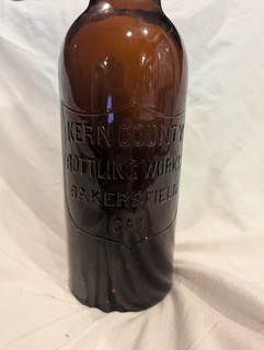 BAKERSFIELD CALIFORNIA KERN COUNTY BOTTLING WORKS AMBER PCGW BOTTLE
