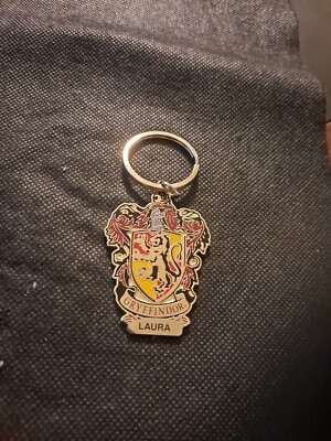 THE WIZARDING WORLD OF HARRY POTTER GRYFFINDOR LAURA KEY CHAIN!   e8952UXX