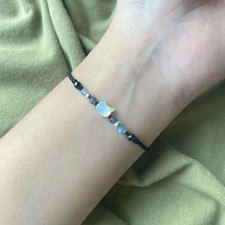 Katze Muschel Armband mit handgewebter Perlenschnur Baumwollseil schwarz weiß
