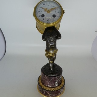 Antike frz. Kaminuhr / Tischuhr mit Bronzefigur auf Marmorsockel
