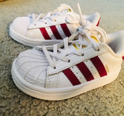 shell toe white with red stripes