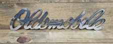 Oldsmobile Script Chrome Steel Sign