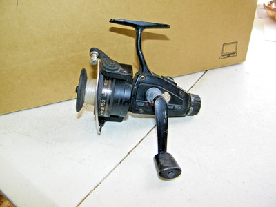 Vintage Black Abu Garcia Cardinal 753 Freshwater Spinning Fishing Reel