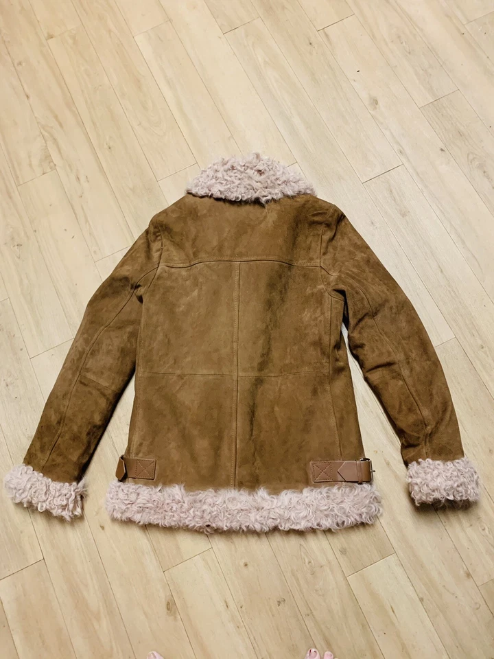 Chaqueta asimétrica Michael Kors genuina de piel de cordero y gamuza talla XS Foto 2 de 4